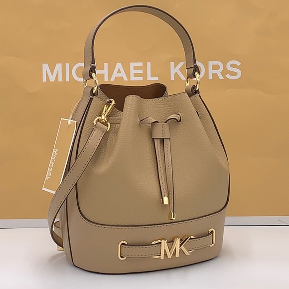 Michael Kors Handbags - MICHAEL KORS REED MEDIUM BELTED BACKED MESSENGER CROSSBODY CAMEL COLOR